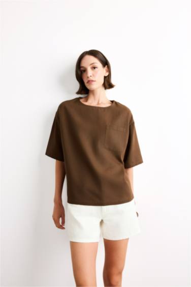 بلوزة نص ردن منسوج قصة مريحة بياخة مستديرة