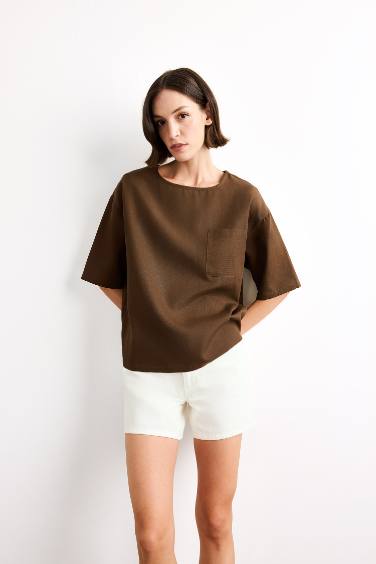 بلوزة نص ردن منسوج قصة مريحة بياخة مستديرة