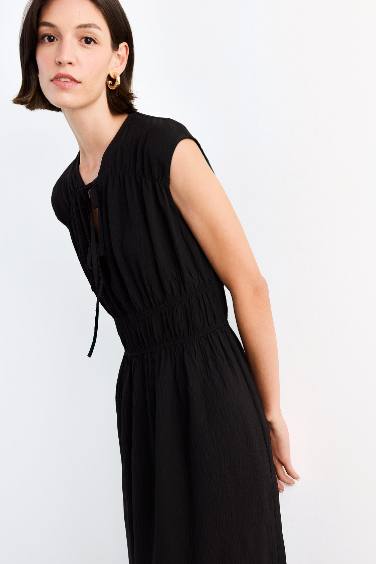 فستان ميدي كت برباط من الأمام