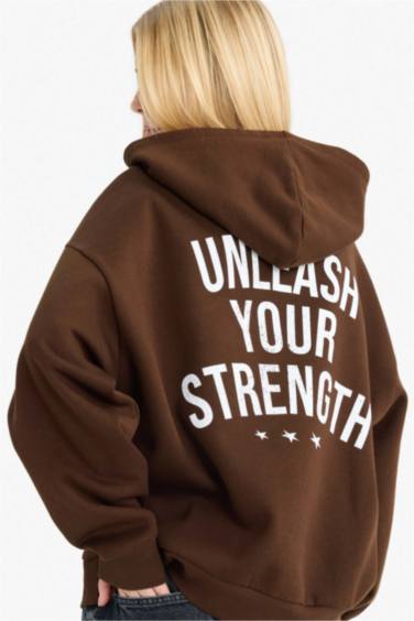 سويت شيرت اوفر سايز مطبوع بكابيشون