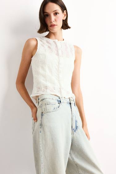 بلوزة كت قطن بياخة مستديرة