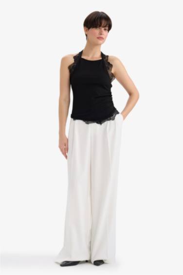 بلوزة منسوج سليم فيت بياقة هالتر