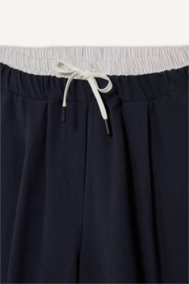 بنطرون قماش ايوسل باجي بجيب مزدوج