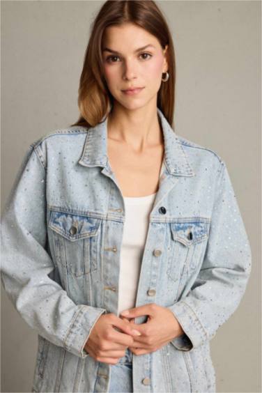 جاكيت جينز بأزرار وجيب