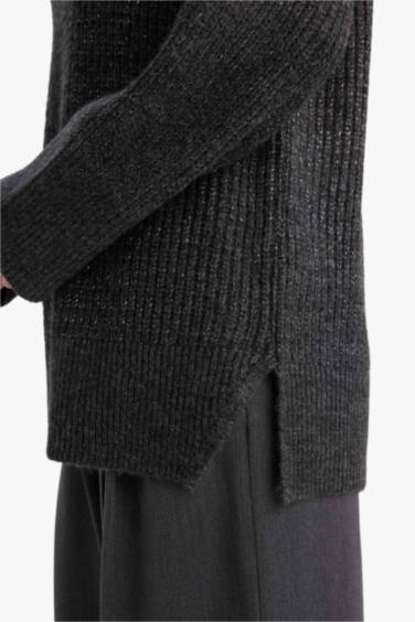 بلوز صوف تريكو طويل قصة فضفاضة