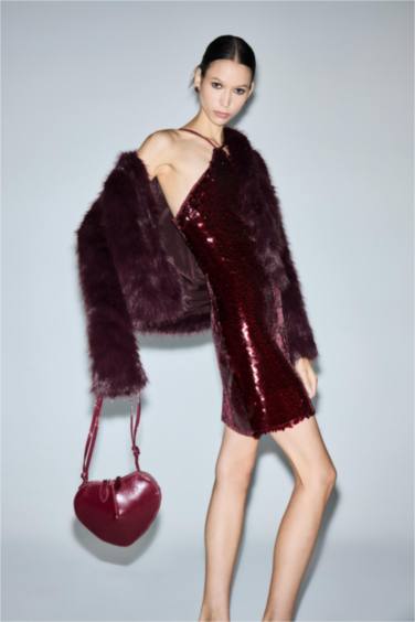 Mini Robe sans manches à col halter en tissu pailleté