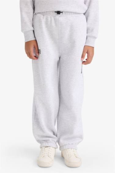 بنطرون ولادي بطبعة شعار اوفر سايز قماش تقيل