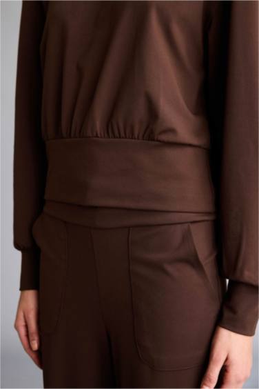 سويت شيرت رياضة بغطاء للرأس