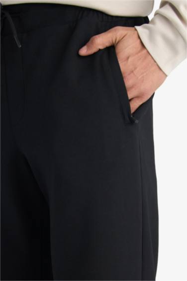 بنطلون بجامة رياضي جوجر قصة عادية