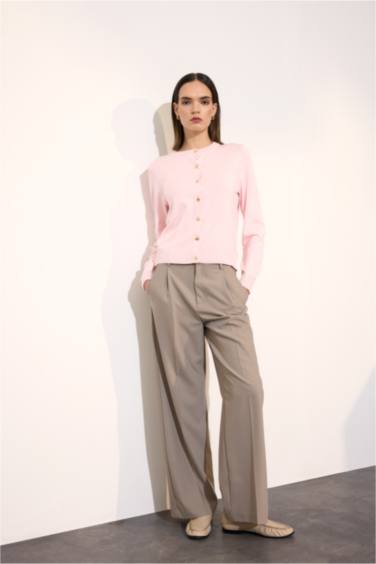 جاكيت تريكو قصة عادية بياخة مستديرة