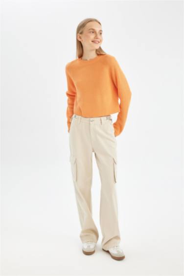 بلوفر تريكو بيزك قصة عادية برقبة مستديرة برتقالي