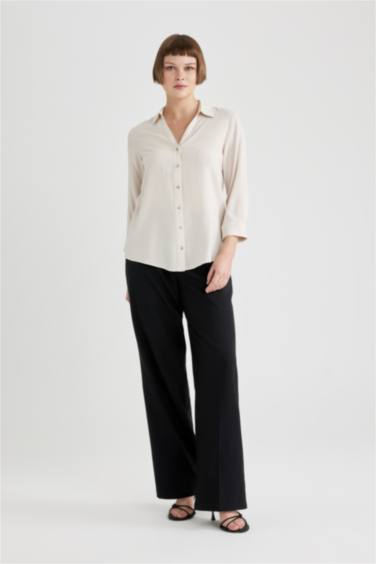 قميص كم طويل قصة عادية