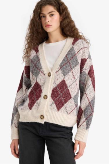 سترة تريكو اوفر سايز برقبة V