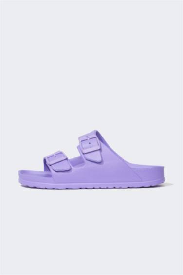 شبشب إيفا بكعب مسطح بشريط مزدوج