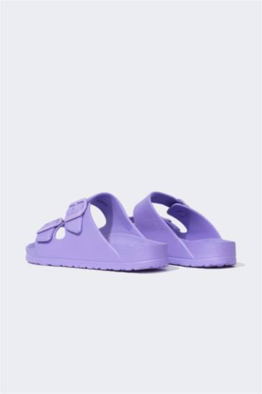 شبشب إيفا بكعب مسطح بشريط مزدوج