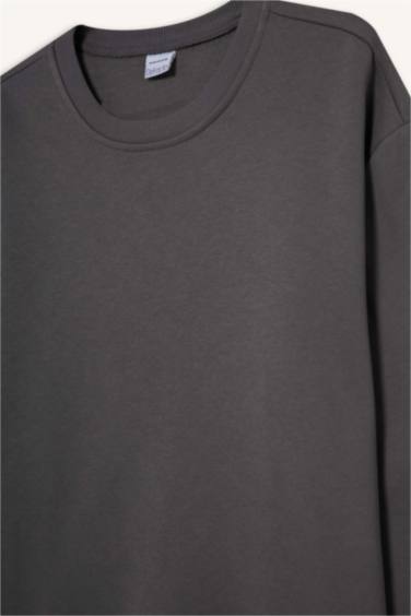 سويت شيرت قصة مريحة بياقة مستديرة