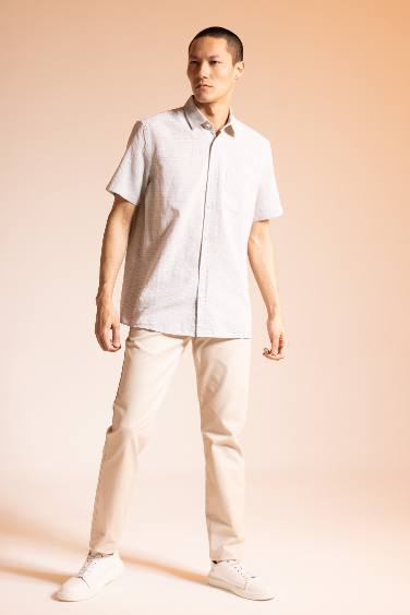 Chemise à col polo et manches courtes 100% coton