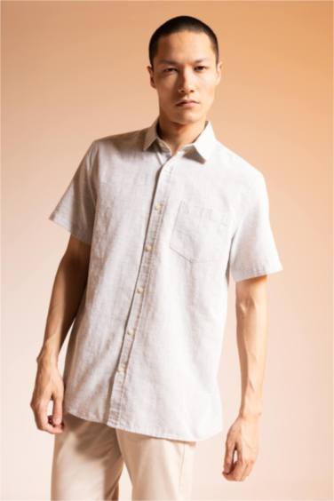 Chemise à col polo et manches courtes 100% coton