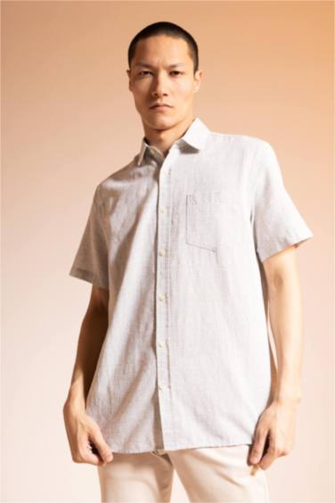 Chemise à col polo et manches courtes 100% coton