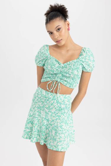 بلوزة كروب توب فلورال نص ردن