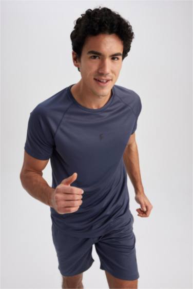 تيشيرت رياضي سليم فيت بياخة مستديرة