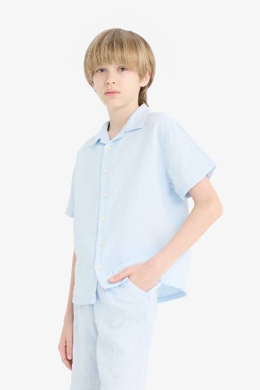 قميص بولو اولادي نص كم موسلين اوفر سايز