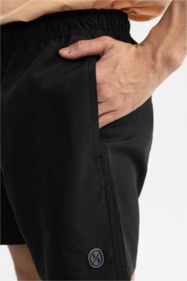 شورت سباحة قصير بيزك