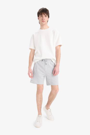 شورت سليم فيت قصة ضيقة بجيب