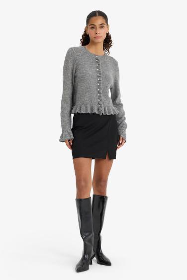 Mini Jupe noire droite à taille normale avec fente