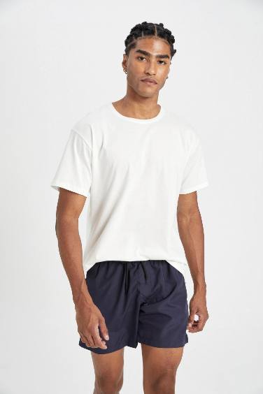 Short de bain avec doublure en filet