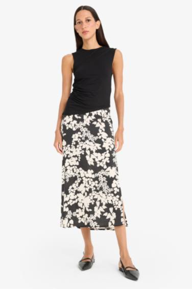 A Cut Patterned Regular Waist Midi Skirt