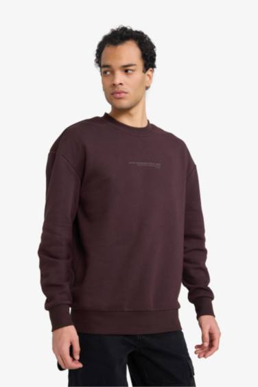 سويت شيرت اوفر سايز بياخة مستديرة