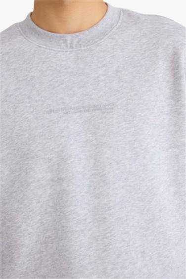 سويت شيرت اوفر سايز بياخة مستديرة