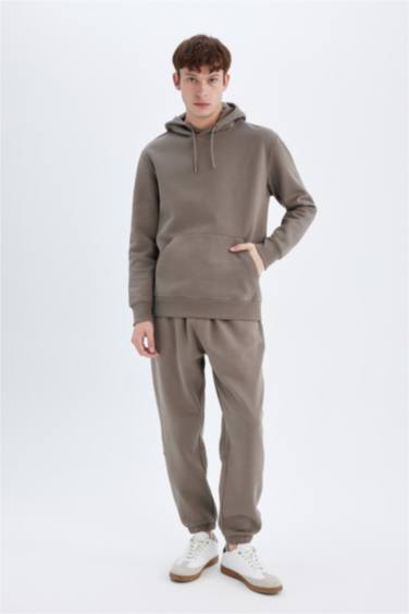 سويت شيرت بيزك قصة عادية بكابيشون وبطانة ناعمة