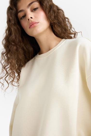 سويت شيرت اوفر سايز تقيل بياخة مستديرة