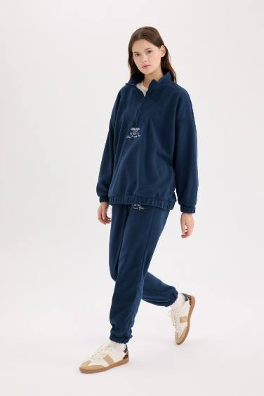 Standart Fit Eşofman Altı Uzun Boy Beli Lastikli Paçası Ayarlanabilir Lastikli Bağcıklı Cepli Baskılı Polar Kumaş