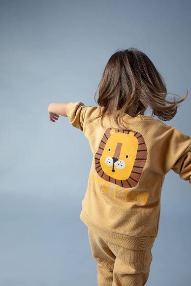 Sweat-shirt à col rond avec motif et intérieur doux pour bébé garçon