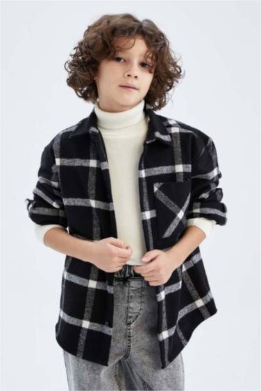 قميص بولو كم طويل وقصة عادية