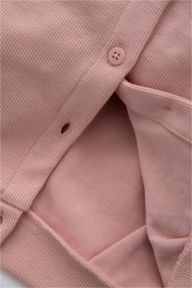 جاكيت تريكو قصة عادية وياقة كبيرة