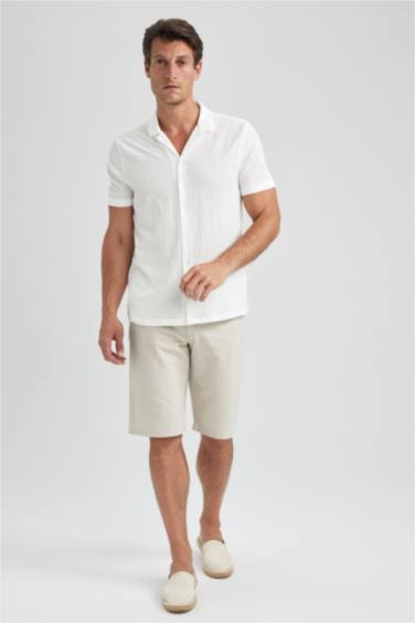 برمودا كتان قصة عادية