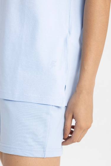 تي شيرت رياضي نص كم بطبعة شعار اوفر سايز من DeFactoFit