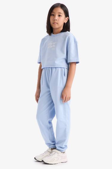 Комплект для девочек: футболка с коротким рукавом и принтом, брюки с эластичной талией и манжетами