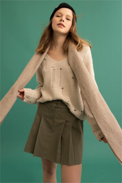 Mini-jupe plissée en gabardine coton