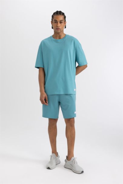 تيشيرت نص ردن اوفر سايز بياخة مستدير من DeFactoFit