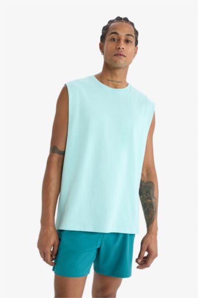 كيمونه رياضي اوفر سايز بياخة مستديرة من DeFactoFit