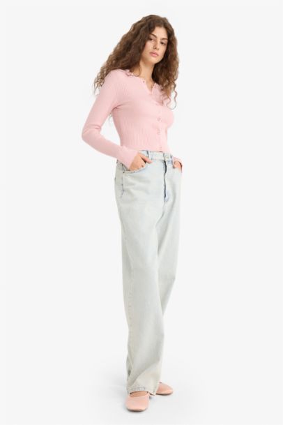 جاكيت تريكو قصة عادية بياخة مستديرة