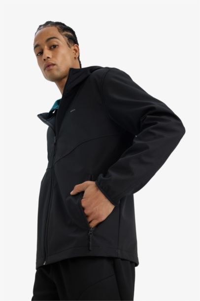 جاكيت مطر قصة عادية بغطاء للرأس مقاوم للماء من DeFactoFit