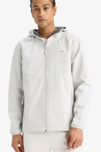 جاكيت مطر قصة عادية بغطاء للرأس مقاوم للماء من DeFactoFit