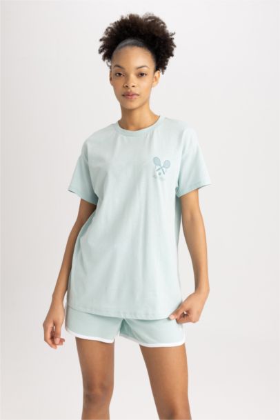 تيشيرت واسع قطن بطباعة الشعار ورقبة مستديرة