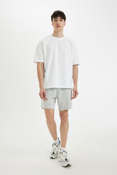 شورت سليم فيت بجيب